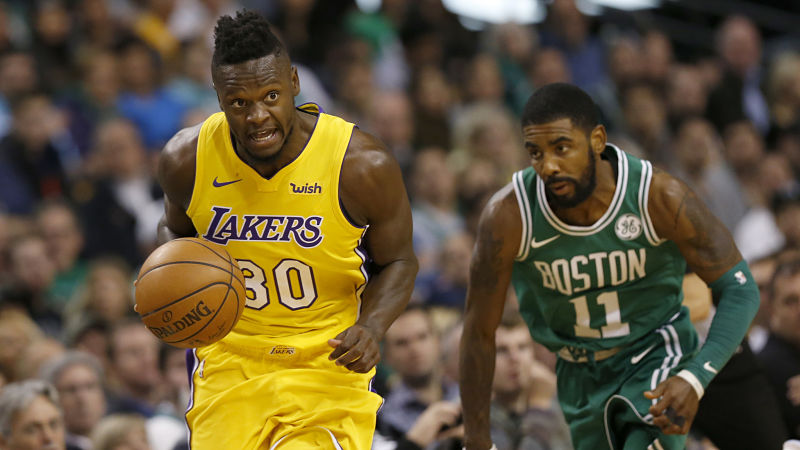 Los Angeles Lakers forward Julius Randle and Boston Celtics point guard Kyrie Irving