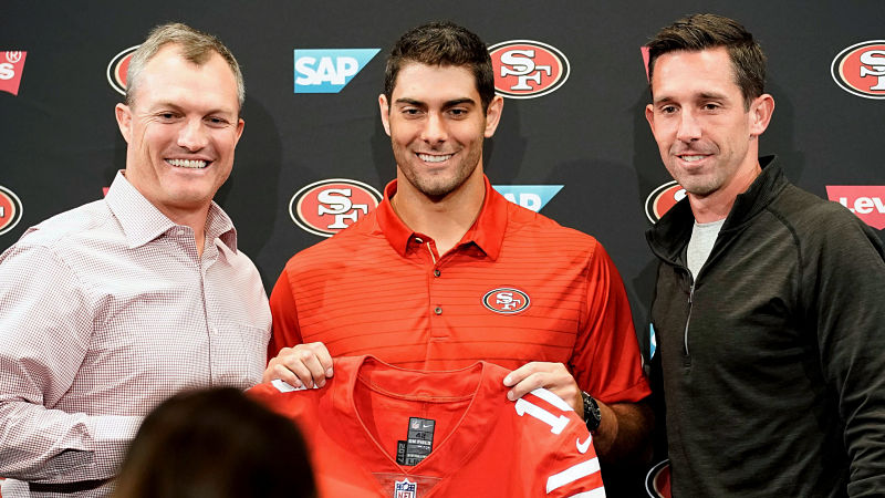 San Francisco 49ers general manager John Lynch, quarterback Jimmy Garoppolo and head coach Kyle Shanahan