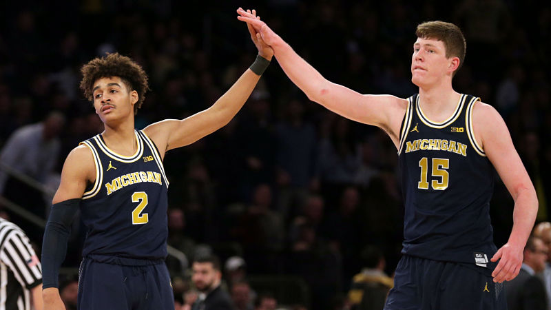 Michigan guard Jordan Poole and center Jon Teske