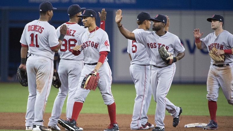 Boston Red Sox Celebrate After 5-4 Victory Over Toronto Blue Jays
