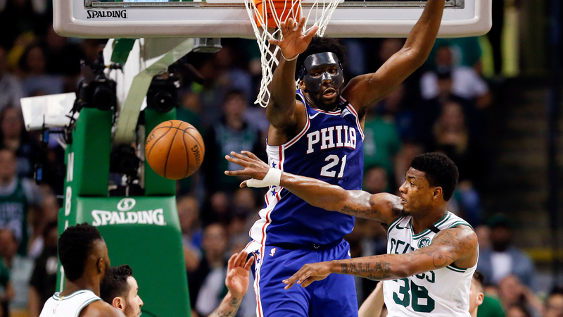 Philadelphia 76ers Center Joel Embiid And Boston Celtics Point Guard Marcus Smart