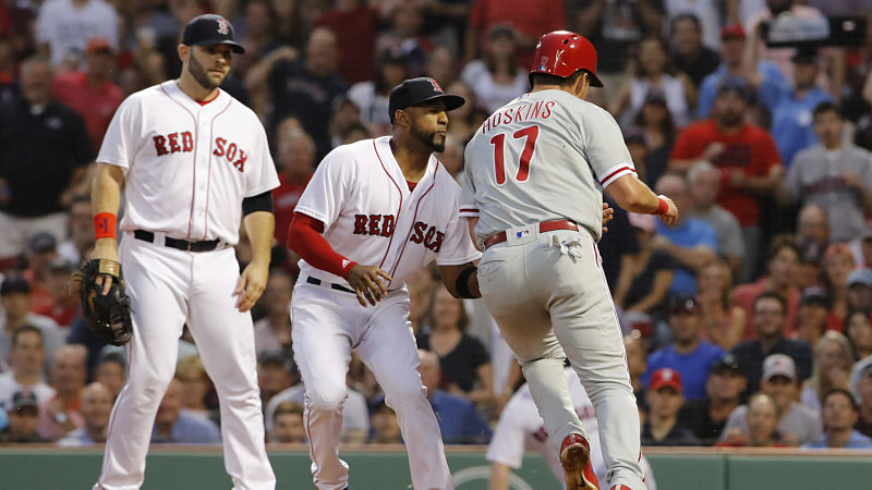 Boston Red Sox third baseman Eduardo Nunez and Philadelphia Phillies left fielder Rhys Hoskins