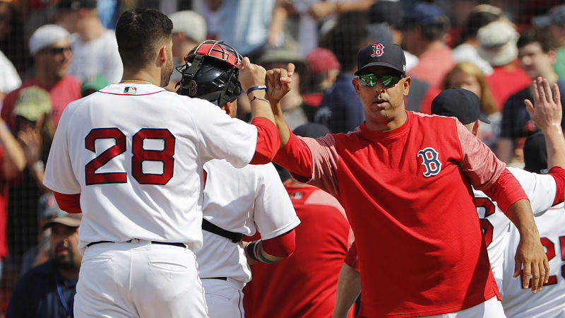 Boston Red Sox designated hitter J.D. Martinez and manager Alex Cora