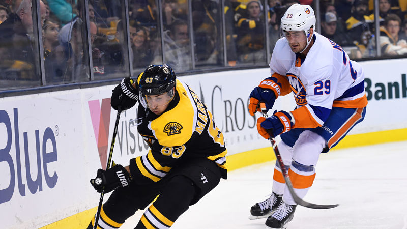 Boston Bruins winger Brad Marchand and New York Islanders forward Nick Leddy