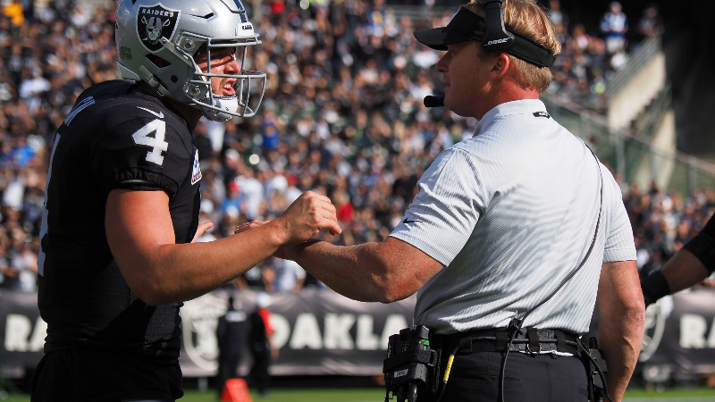 Oakland Raiders quarterback Derek Carr and head coach Jon Gruden