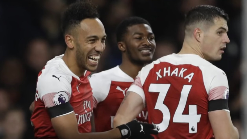 Arsenal's Pierre-Emerick Aubameyang (left), Ainsley Maitland-Niles and Granit Xhaka (right)
