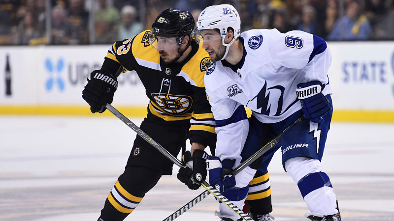 Boston Bruins forward Brad Marchand and Tampa Bay Lightning forward Tyler Johnson