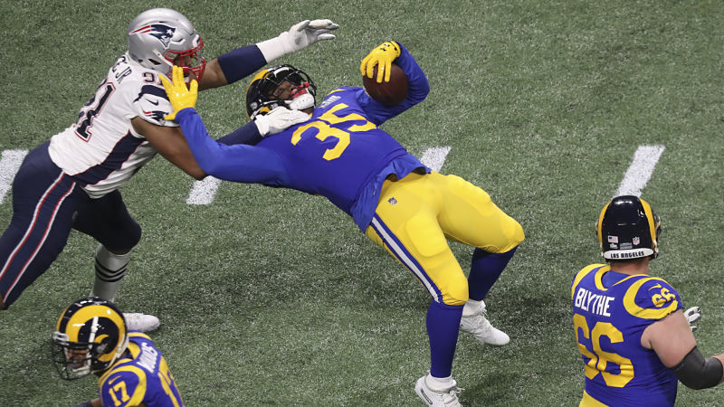 New England Patriots defensive end Deatrich Wise Jr. and Los Angeles Rams running back C.J. Anderson