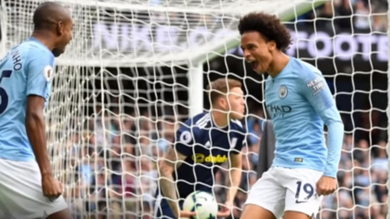 Manchester City's Fernandinho (left) and Leroy Sane