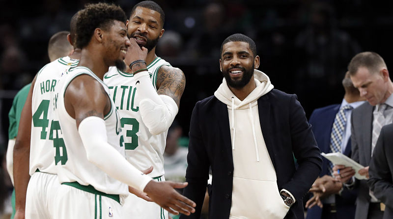 Boston Celtics guards Kyrie Irving and Marcus Smart and forward Marcus Morris