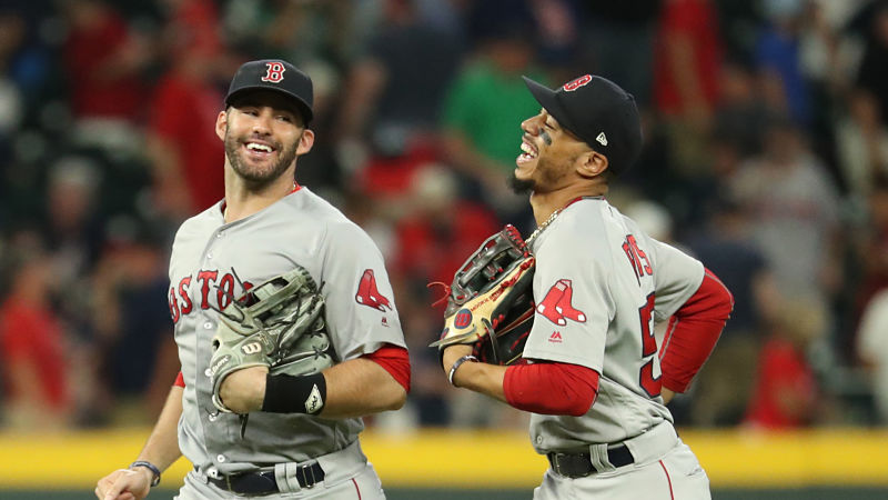 Boston Red Sox Outfielders J.D. Martinez, Mookie Betts