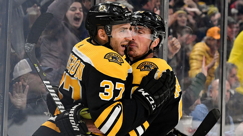 Boston Bruins forwards Patrice Bergeron and Brad Marchand