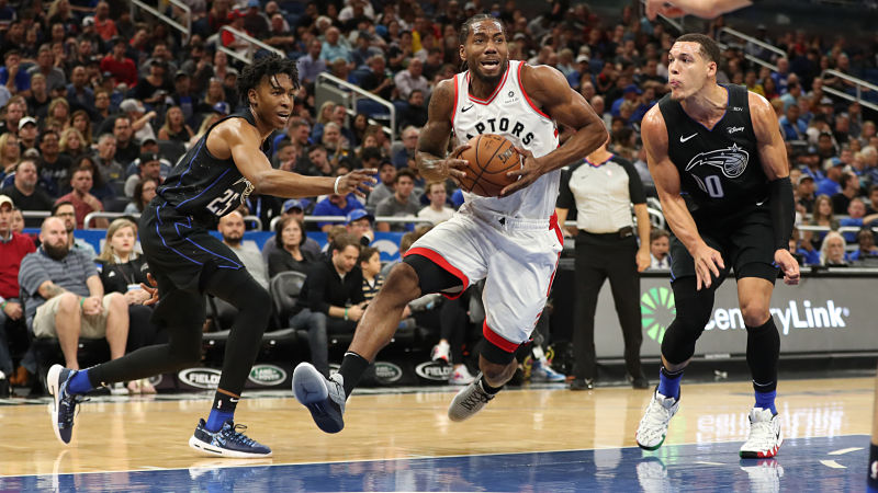 Toronto Raptors forward Kawhi Leonard and Orlando Magic forward Aaron Gordon