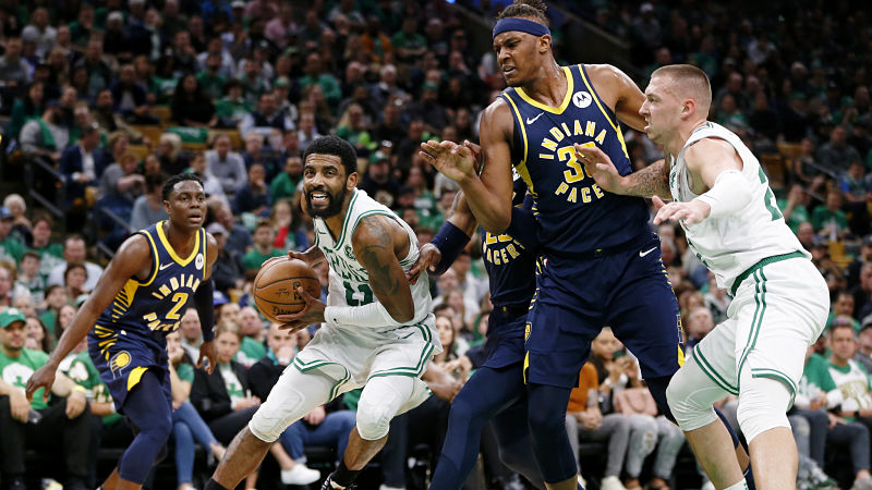 Boston Celtics guard Kyrie Irving and center Daniel Theis