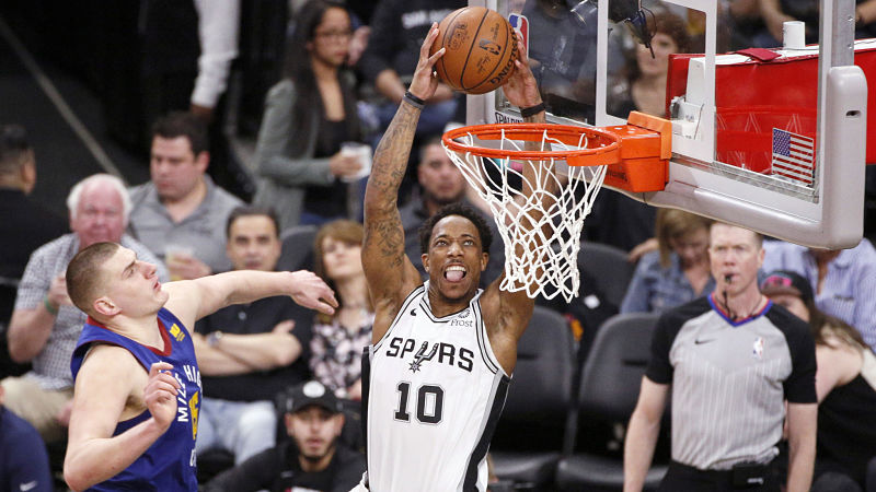 Denver Nuggets center Nikola Jokic and San Antonio Spurs guard DeMar DeRozan