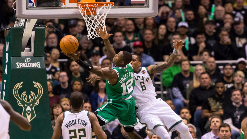 Boston Celtics guard Terry Rozier (12) and Milwaukee Bucks guard Eric Bledsoe (6)