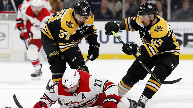 Boston Bruins' Patrice Bergeron And Brad Marchand