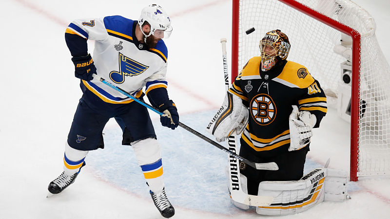 St. Louis Blues forward Patrick Maroon and Boston Bruins goalie Tuukka Rask