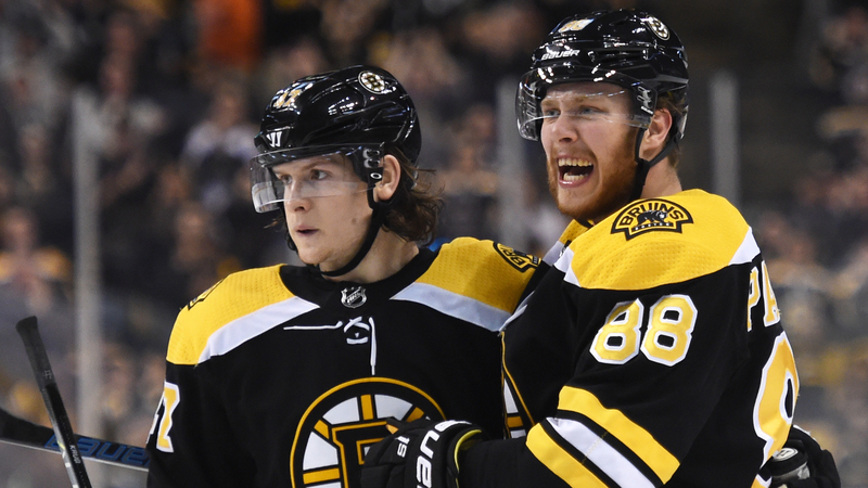 Boston Bruins Defenseman Torey Krug And Winger David Pastrnak