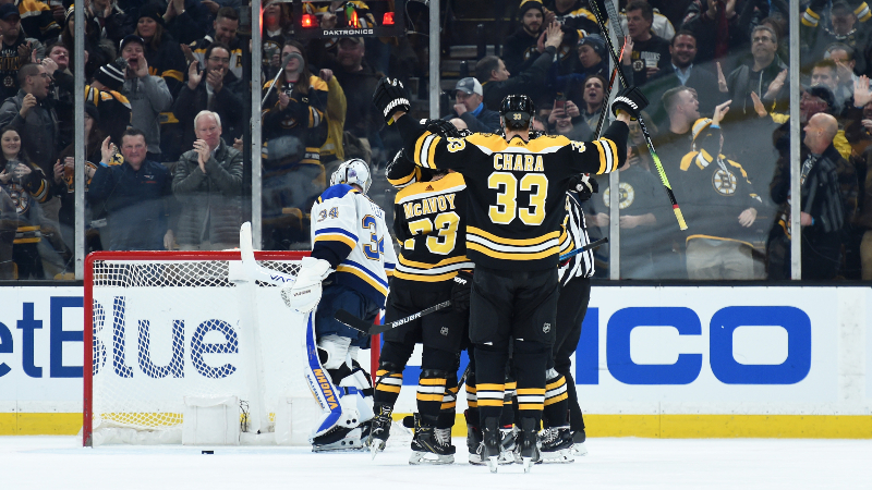 Boston Bruins defensemen Zdeno Chara (33) and Charlie McAvoy (73)