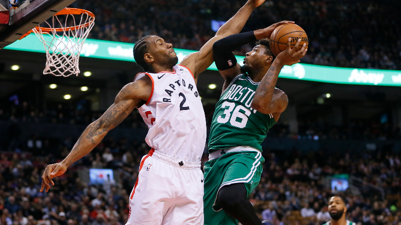 Toronto Raptors forward Kawhi Leonard (2) and Boston Celtics guard Marcus Smart (36)