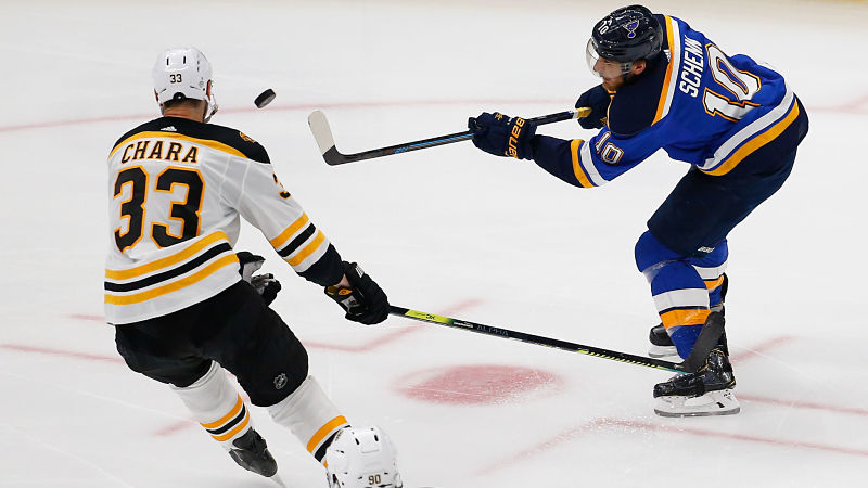 Boston Bruins defenseman Zdeno Chara and St. Louis Blues forward Brayden Schenn