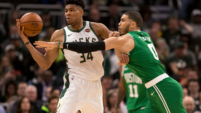 Milwaukee Bucks forward Giannis Antetokounmpo (34) and Boston Celtics forward Jayson Tatum