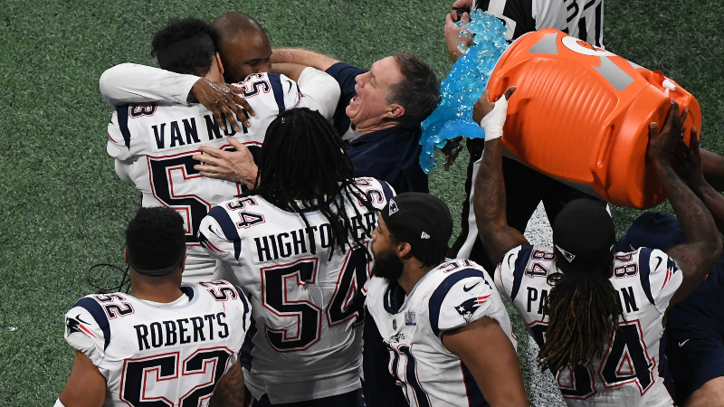 New England Patriots head coach Bill Belichick and players