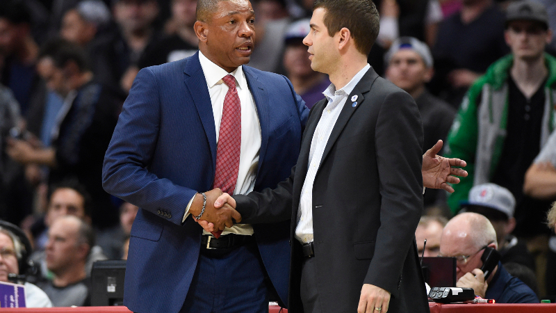 Los Angeles Clippers head coach Doc Rivers (left) and Boston Celtics head coach Brad Stevens
