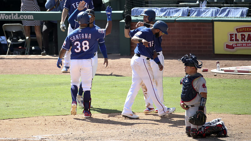 Texas Rangers center fielder Danny Santana and Boston Red Sox catcher Juan Centeno