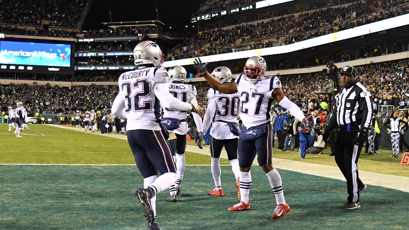 New England Patriots free safety Devin McCourty (32) and cornerback J.C. Jackson (27)