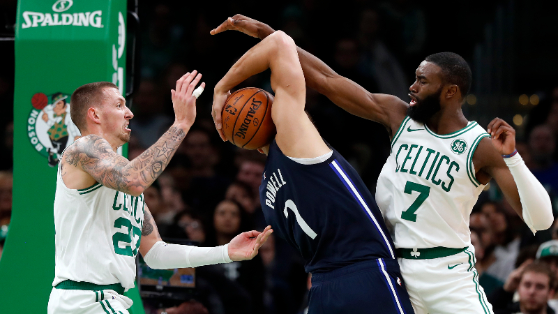 Boston Celtics guard Jaylen Brown (7) and center Daniel Theis (27) and Dallas Mavericks forward Dwight Powell (7)
