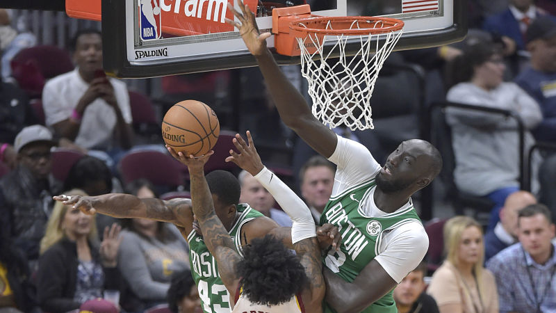 Cleveland Cavaliers guard Kevin Porter Jr. and Boston Celtics center Tacko Fall