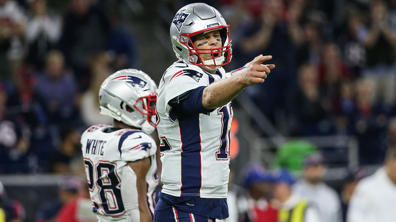 New England Patriots running back James White and quarterback Tom Brady