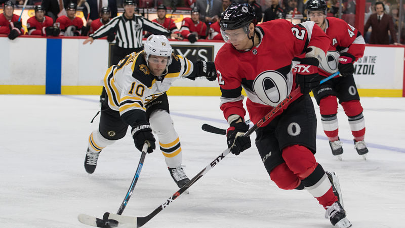 Ottawa Senators defenseman Nikita Zaitsev and Boston Bruins left wing Anders Bjork