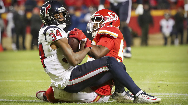 Houston Texans running back Taiwan Jones and Kansas City Chiefs linebacker Demone Harris