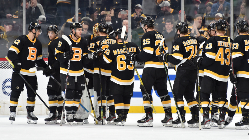 Boston Bruins' Brad Marchand, Brandon Carlo