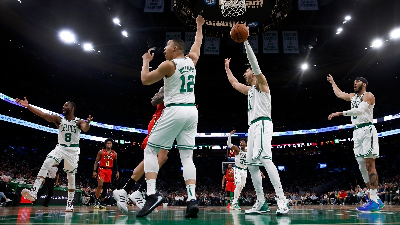 Boston Celtics from left, guard Kemba Walker (8), forward Grant Williams (12), center Enes Kanter (11) and forward Jayson Tatum (0)