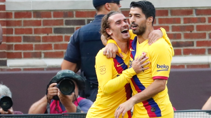 Barcelona forwards Antoine Griezmann (left) and Luis Suarez