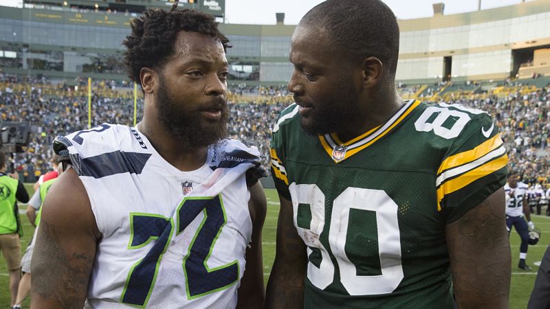 Former NFL defensive lineman Michael Bennett and tight end Martellus Bennett