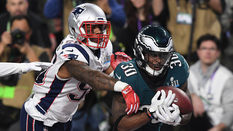 New England Patriots linebacker Marquis Flowers and Philadelphia Eagles running back Corey Clement