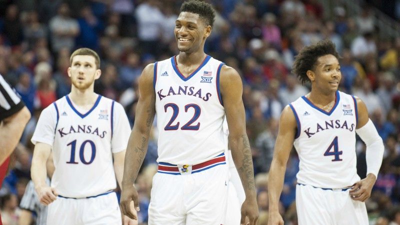 Kansas Jayhawks' Sviatoslav Mykhailiuk, Silvio De Sousa and Devonte' Graham