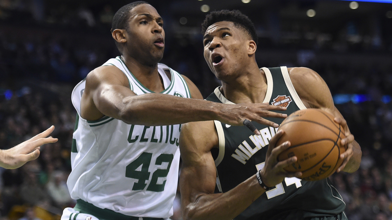 Al Horford guards Giannis Antetokounmpo