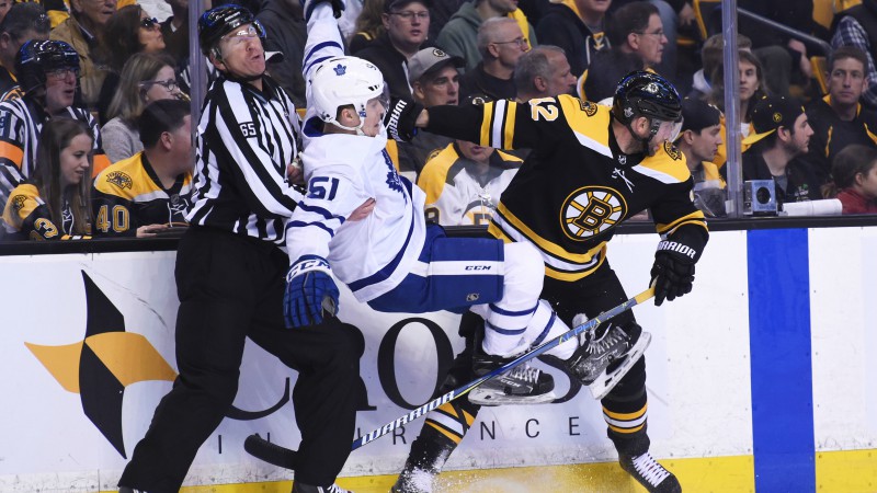 Boston Bruins right wing David Backes and Toronto Maple Leafs defenseman Jake Gardiner