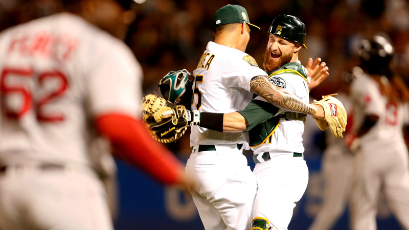 Oakland Athletics Catcher Jonathan Lucroy And Starting Pitcher Sean Manaea