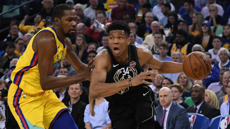 Milwaukee Bucks forward Giannis Antetokounmpo (right) and Golden State Warriors forward Kevin Durant