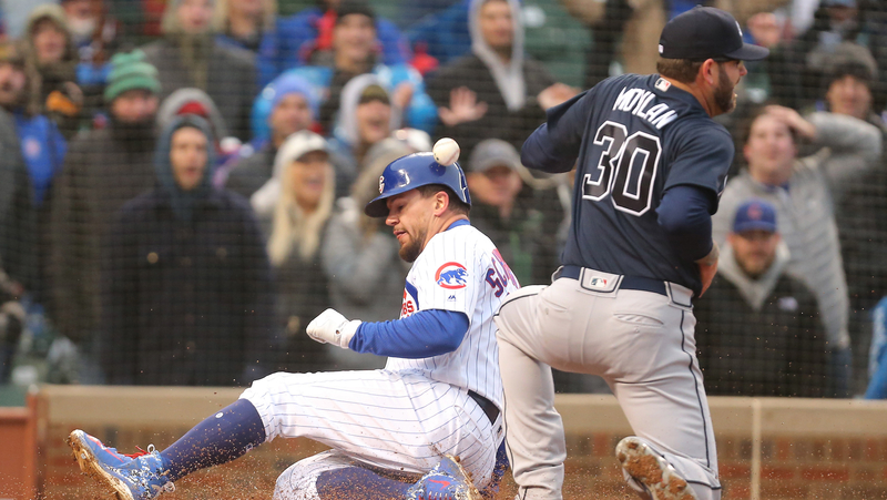 Atlanta Braves Relief Pitcher Peter Moylan And Chicago Cubs Outfielder Kyle Schwarber