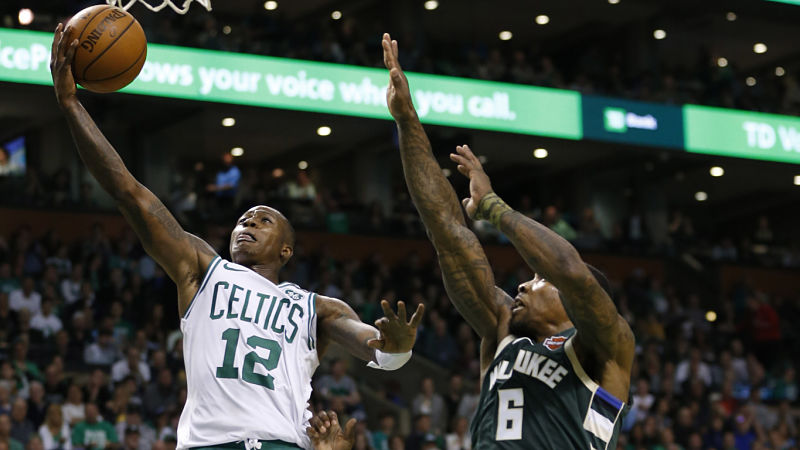 Boston Celtics guard Terry Rozier and Milwaukee Bucks guard Eric Bledsoe