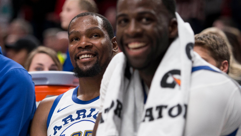 Golden State Warriors forward Kevin Durant and Draymond Green