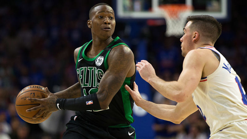 Boston Celtics guard Terry Rozier and Philadelphia 76ers guard T.J. McConnell